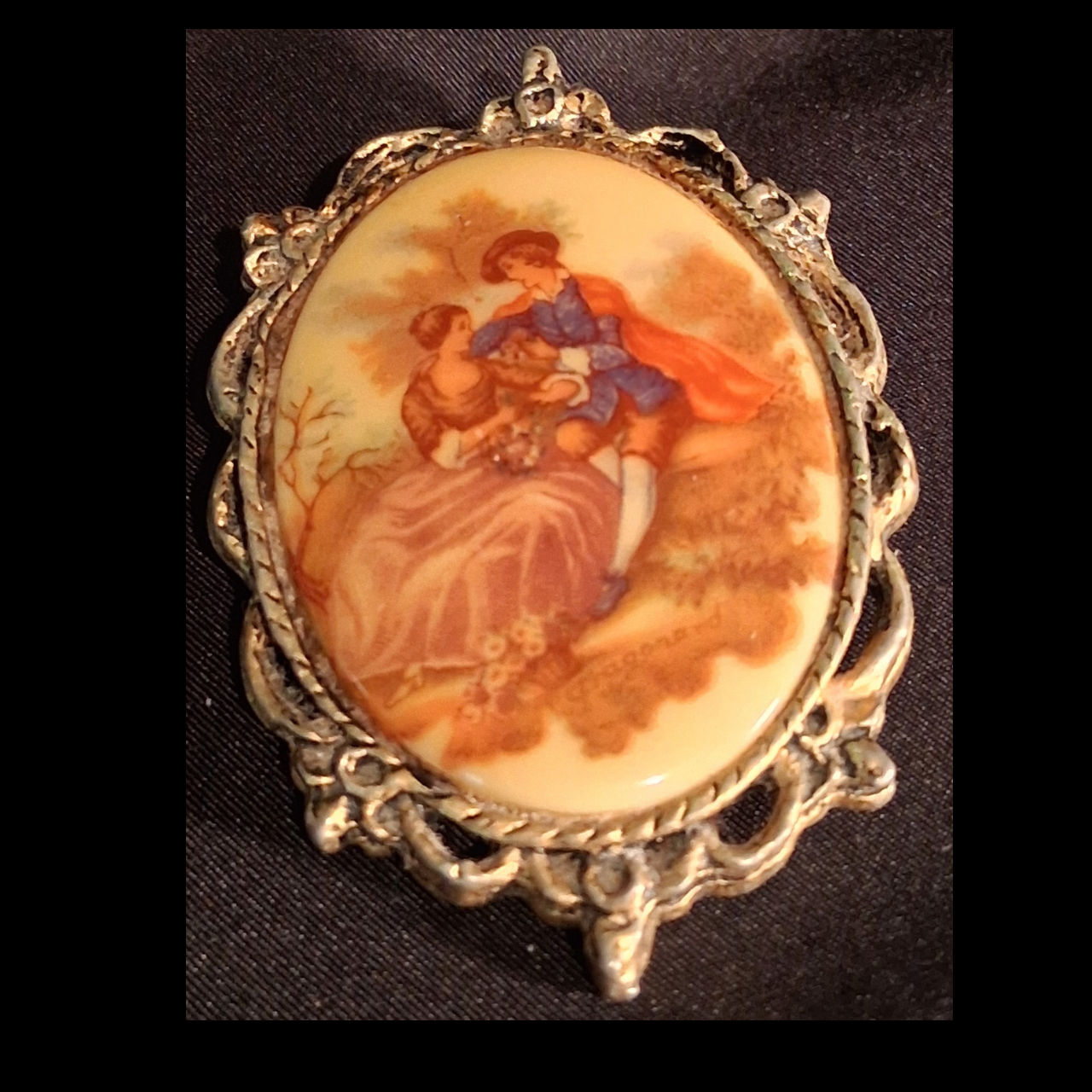 Vintage Romantic Scene Porcelain Brooch with Ornate Filigree Frame
